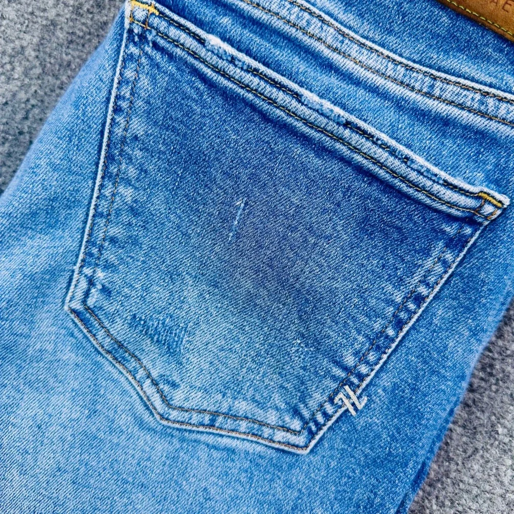 American Eagle AE77 Low-Rise Flare Jeans Womens 6 Med Wash Distressed Blue Y2K